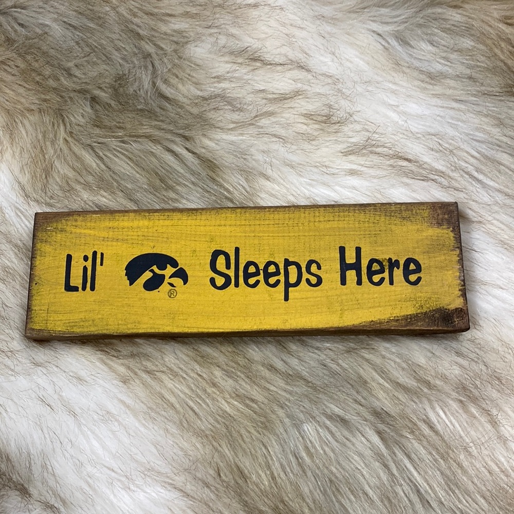 ‘Lil’ Hawkeye Sleeps Here’ Wooden Distressed Sign Iowa Hawkeyes Herky “Lil’ Hawk